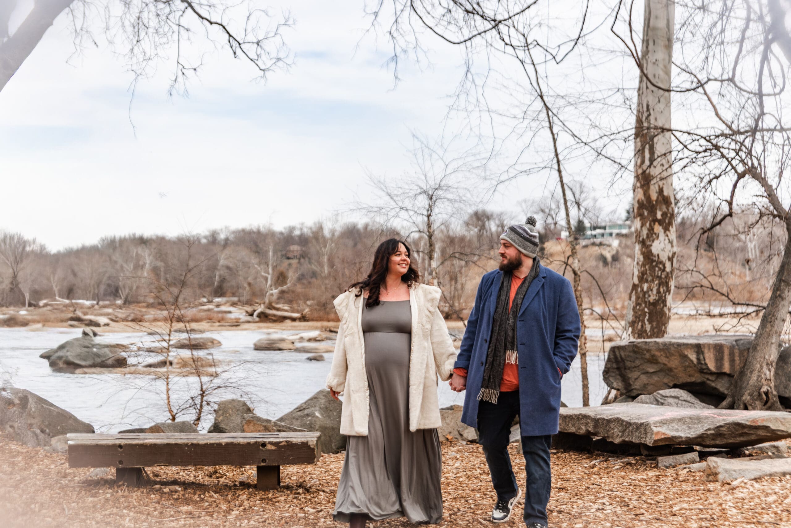maternity session pony pasture richmond va winter. expecting couple walking by the water.